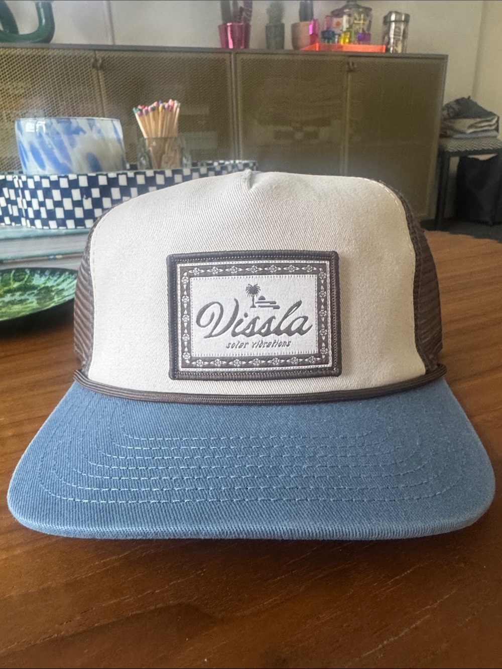 VISSLA Two-Tone Trucker Hat in Cream, Blue and Brown